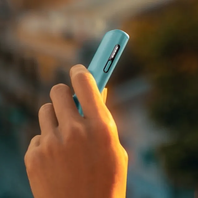 IQOS advisor in an IQOS store